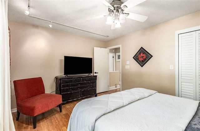 1071 Standard Dr NE, Brookhaven, GA 30319 - bedroom with wood finished floors, a closet, and ceiling fan