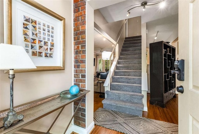1071 Standard Dr NE, Brookhaven, GA 30319 - stairs with wood finished floors and track lighting