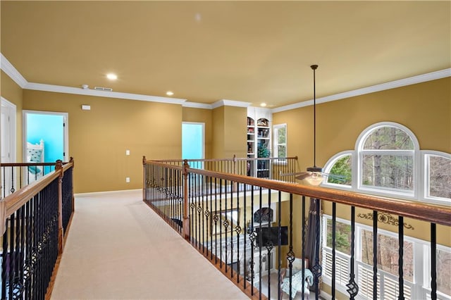 hall with recessed lighting, carpet flooring, visible vents, baseboards, and ornamental molding