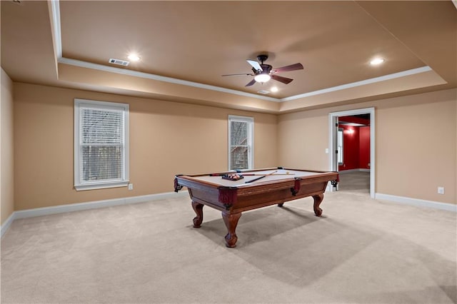 game room with light carpet, a raised ceiling, and visible vents