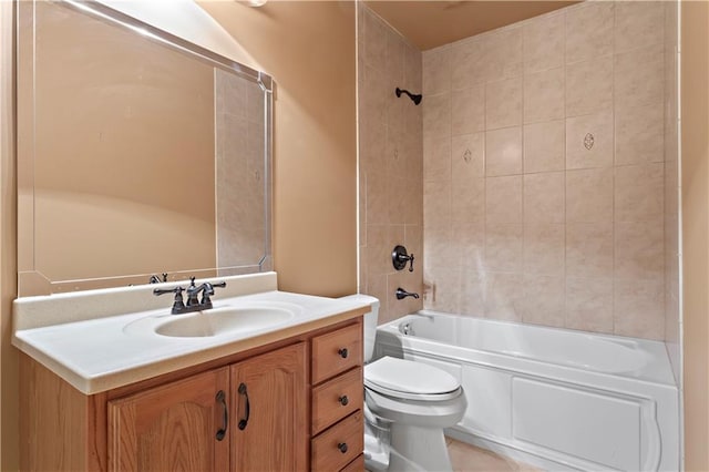 bathroom featuring bathtub / shower combination, vanity, and toilet