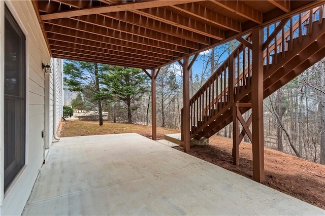 view of patio featuring stairs