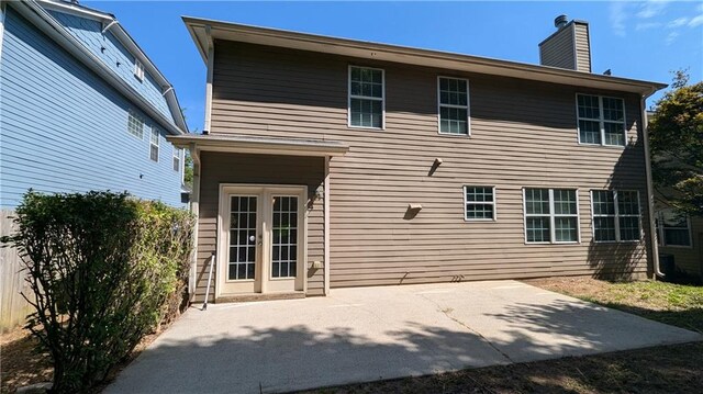 rear view of house featuring a patio area