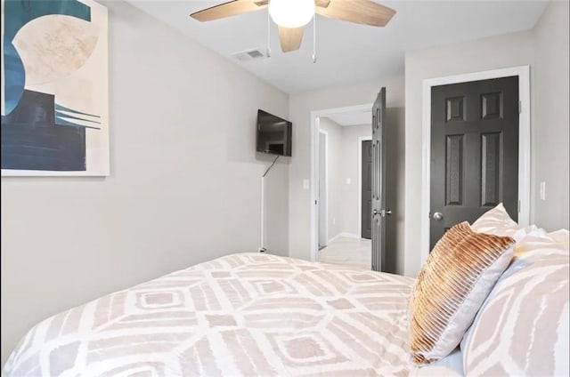 bedroom featuring ceiling fan