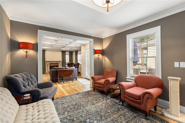 711 Greenview Ave NE, Atlanta, GA 30305 - living area featuring wood finished floors, coffered ceiling, a premium fireplace, ornamental molding, and beamed ceiling