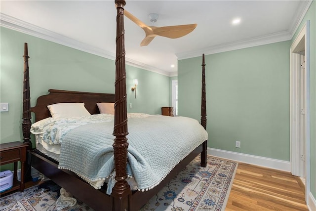 711 Greenview Ave NE, Atlanta, GA 30305 - bedroom with ornamental molding, wood finished floors, baseboards, ceiling fan, and recessed lighting