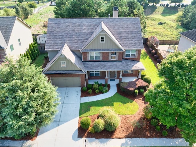 view of front of home featuring a front yard and a garage