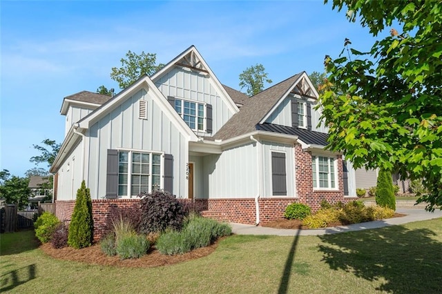 2208 Sage Mountain Ct SW, Marietta, GA 30064 - view of front of house with board and batten siding, brick siding, and roof with shingles