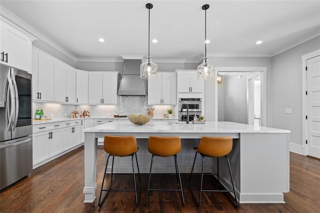 2208 Sage Mountain Ct SW, Marietta, GA 30064 - kitchen with stainless steel appliances, custom exhaust hood, decorative backsplash, light countertops, and ornamental molding