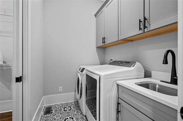 2208 Sage Mountain Ct SW, Marietta, GA 30064 - laundry area with separate washer and dryer and cabinet space