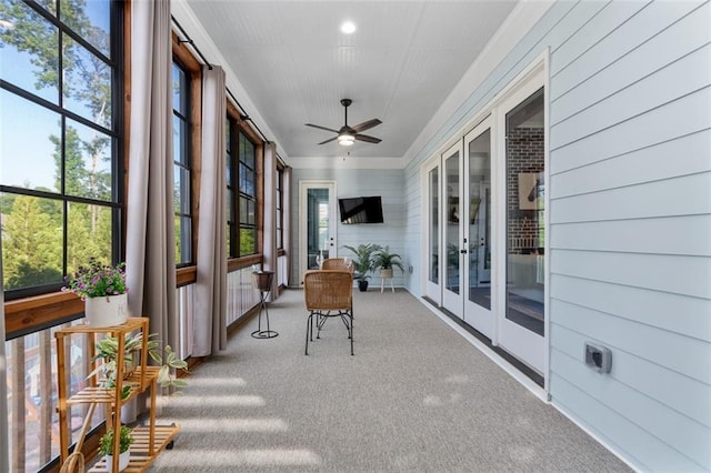 2208 Sage Mountain Ct SW, Marietta, GA 30064 - sunroom with french doors, carpet, a ceiling fan, wooden walls, and plenty of natural light