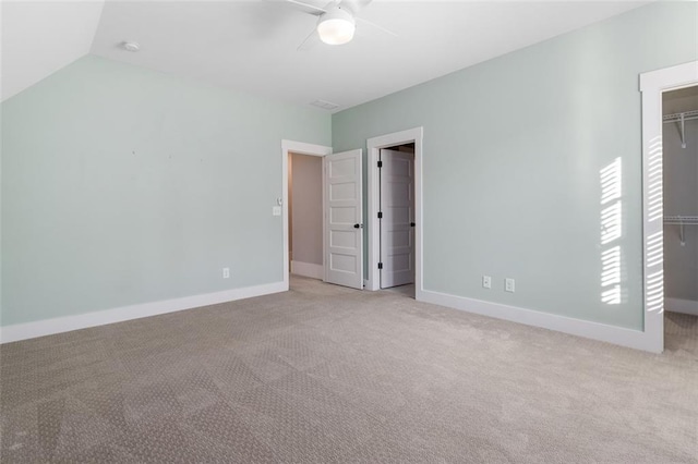 2208 Sage Mountain Ct SW, Marietta, GA 30064 - unfurnished bedroom with a spacious closet, a closet, carpet floors, and ceiling fan