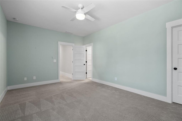 2208 Sage Mountain Ct SW, Marietta, GA 30064 - carpeted empty room with a ceiling fan and a smoke detector