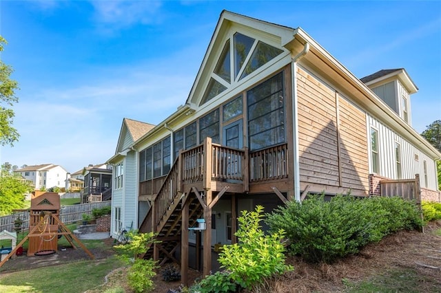 2208 Sage Mountain Ct SW, Marietta, GA 30064 - rear view of house with a deck, stairs, and a residential view