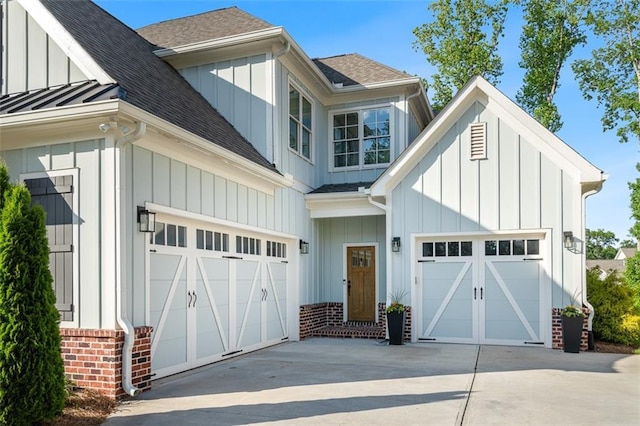 2208 Sage Mountain Ct SW, Marietta, GA 30064 - view of front of home with driveway, a shingled roof, board and batten siding, and brick siding
