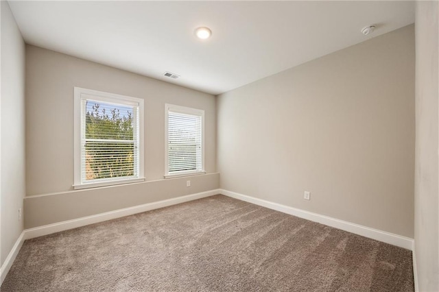 view of carpeted spare room