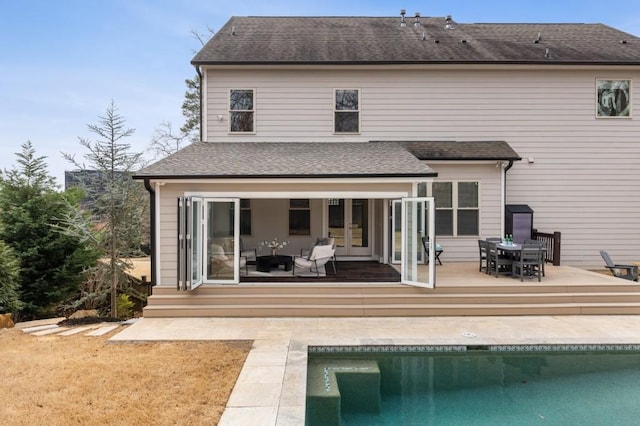 rear view of house featuring a patio