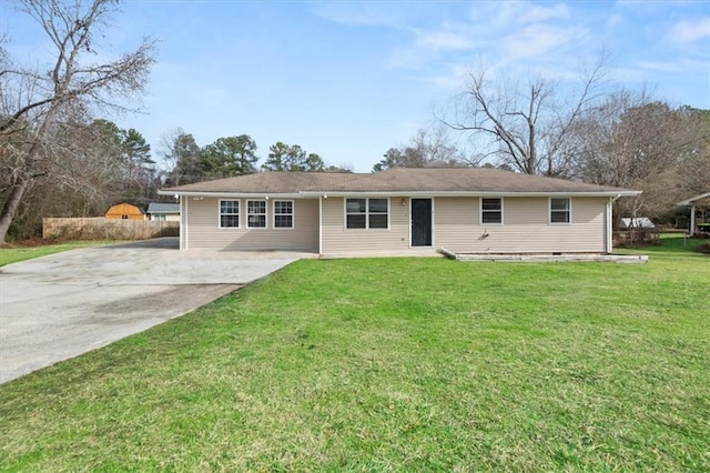 ranch-style house featuring a front lawn