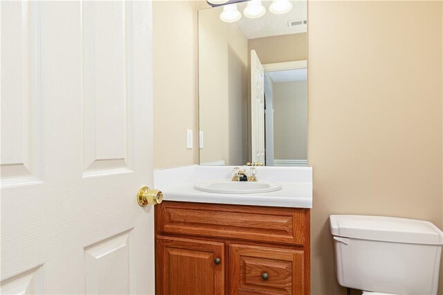 1731 Silverchase SW, Marietta, GA 30008 - half bathroom with toilet, vanity, and visible vents