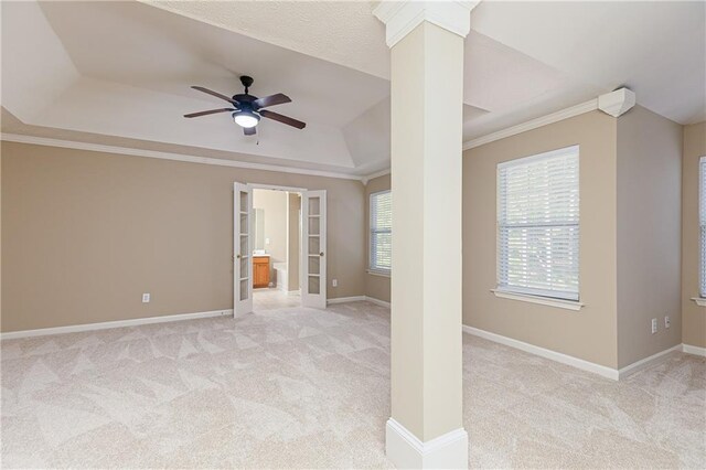 1731 Silverchase SW, Marietta, GA 30008 - unfurnished room featuring baseboards, a tray ceiling, ceiling fan, and light carpet