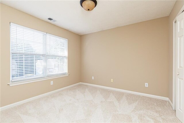 1731 Silverchase SW, Marietta, GA 30008 - empty room featuring baseboards, visible vents, and carpet
