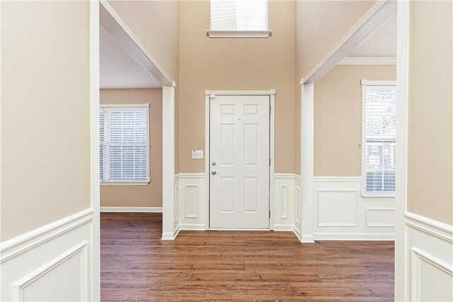 1731 Silverchase SW, Marietta, GA 30008 - entrance foyer featuring wainscoting, wood finished floors, and ornamental molding