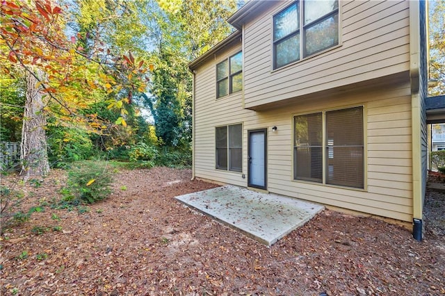 back of property with a patio area