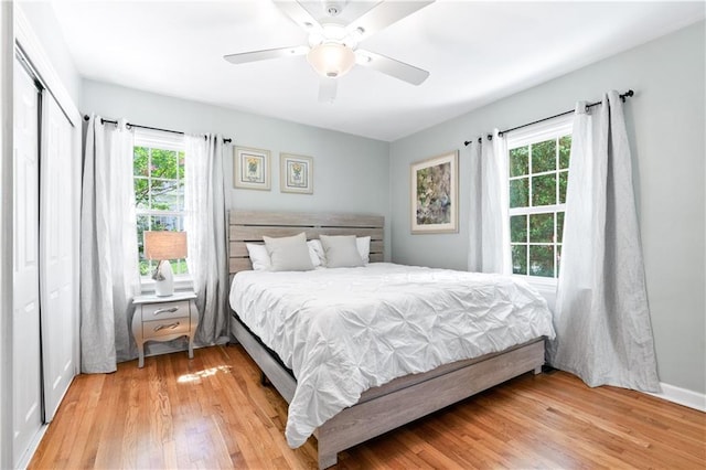 1359 Scott Blvd, Decatur, GA 30030 - bedroom featuring multiple windows, wood finished floors, ceiling fan, and baseboards