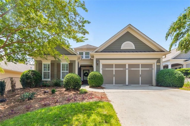 view of front facade featuring an attached garage and driveway