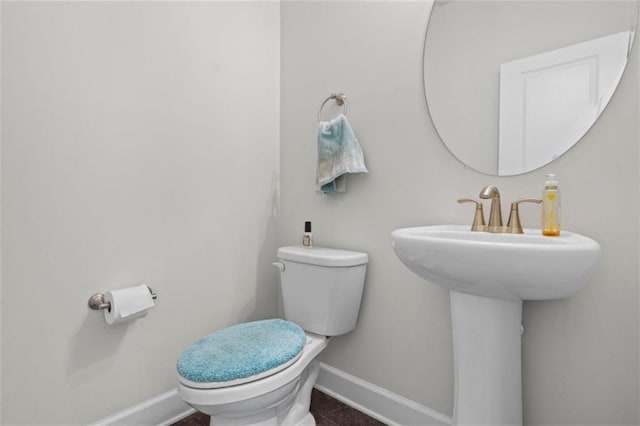 55 Clubhouse Way, Acworth, GA 30101 - half bathroom featuring baseboards, toilet, and a sink