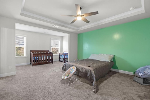 55 Clubhouse Way, Acworth, GA 30101 - bedroom featuring a tray ceiling, multiple windows, carpet flooring, and baseboards