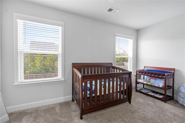55 Clubhouse Way, Acworth, GA 30101 - carpeted bedroom featuring baseboards and a crib