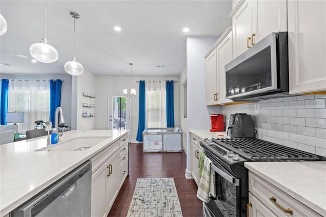 55 Clubhouse Way, Acworth, GA 30101 - kitchen featuring stainless steel appliances, a sink, light countertops, backsplash, and recessed lighting
