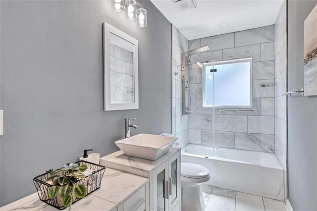 full bathroom featuring visible vents, toilet, shower / bath combination, and vanity