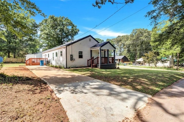 bungalow with a front lawn