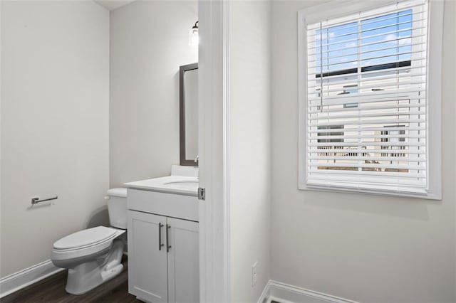 3382 Monarch Ave, Duluth, GA 30096 - half bathroom featuring vanity and wood finished floors