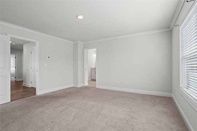 3382 Monarch Ave, Duluth, GA 30096 - spare room with light colored carpet and ornamental molding