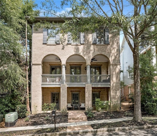 view of front of property with a balcony