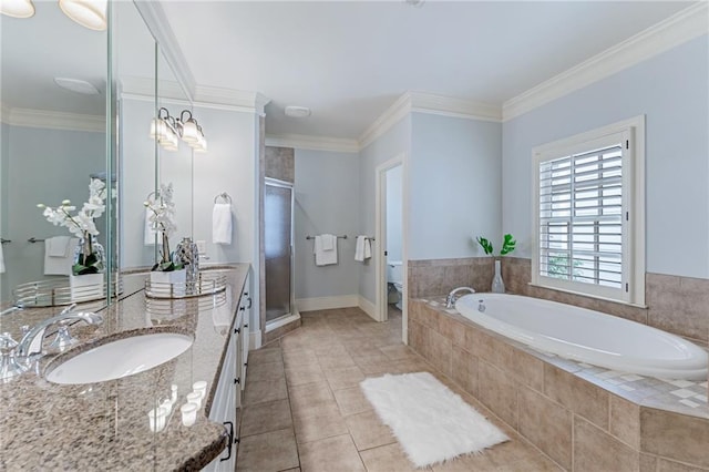 bathroom featuring tile patterned floors, crown molding, plus walk in shower, and vanity