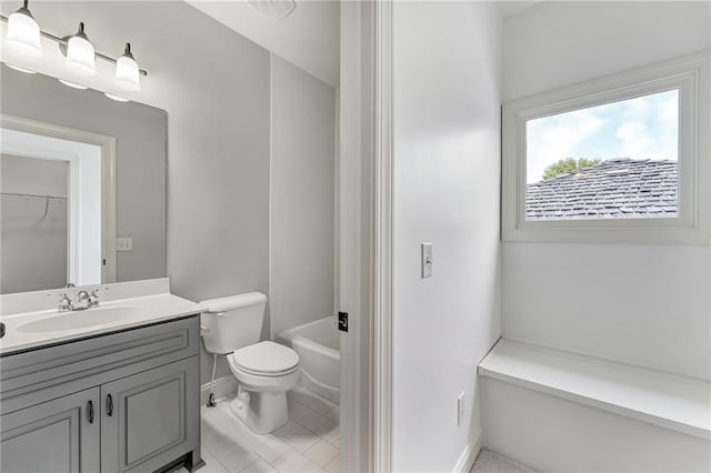 bathroom featuring toilet, tile patterned floors, and vanity