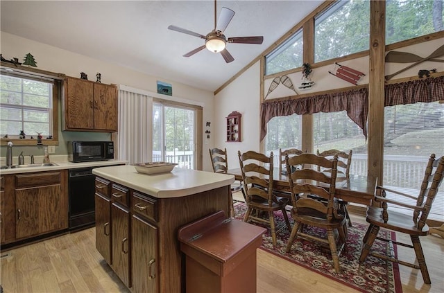 214 S View Trl, Jasper, GA 30143 - kitchen featuring black appliances, light wood-style flooring, ceiling fan, healthy amount of natural light, and high vaulted ceiling