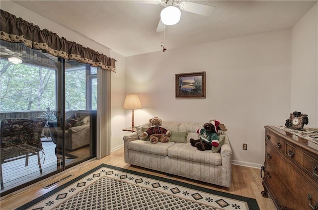 214 S View Trl, Jasper, GA 30143 - living room featuring light wood-style floors and ceiling fan