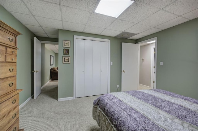 214 S View Trl, Jasper, GA 30143 - bedroom with light carpet, a paneled ceiling, and a closet