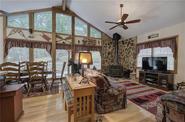 214 S View Trl, Jasper, GA 30143 - living room with a wood stove, wood finished floors, ceiling fan, high vaulted ceiling, and beamed ceiling