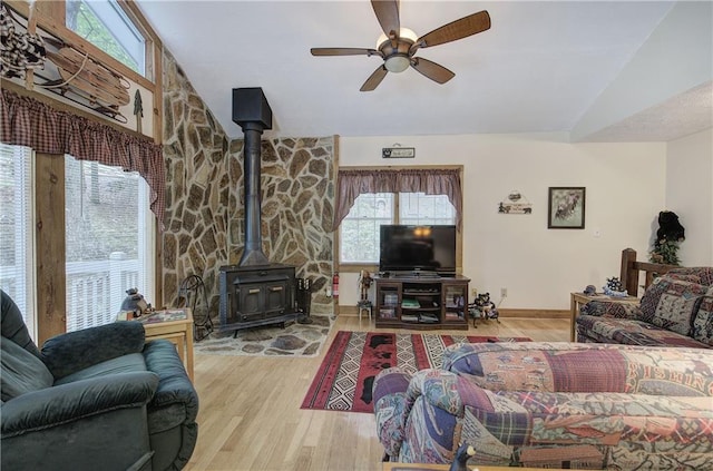 214 S View Trl, Jasper, GA 30143 - living room with a wood stove, a ceiling fan, lofted ceiling, and wood finished floors