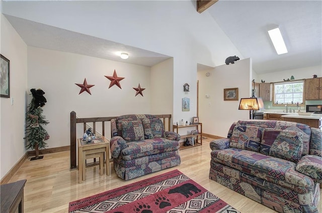 214 S View Trl, Jasper, GA 30143 - living room featuring high vaulted ceiling, light wood-style floors, and beam ceiling