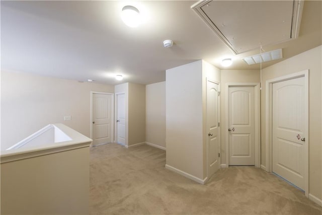 570 Eldridge Dr, Suwanee, GA 30024 - below grade area with baseboards, light carpet, and visible vents