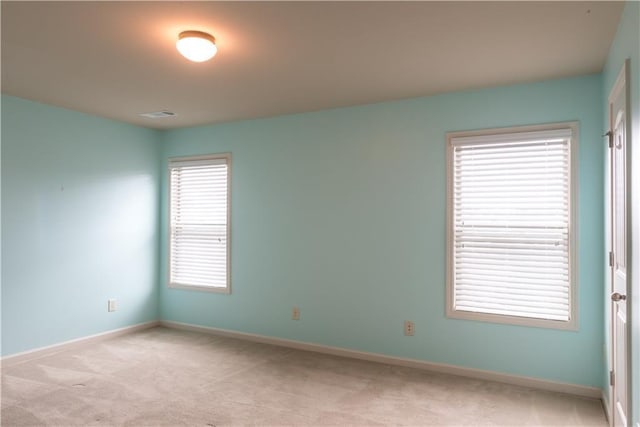 570 Eldridge Dr, Suwanee, GA 30024 - empty room with baseboards, light colored carpet, and visible vents