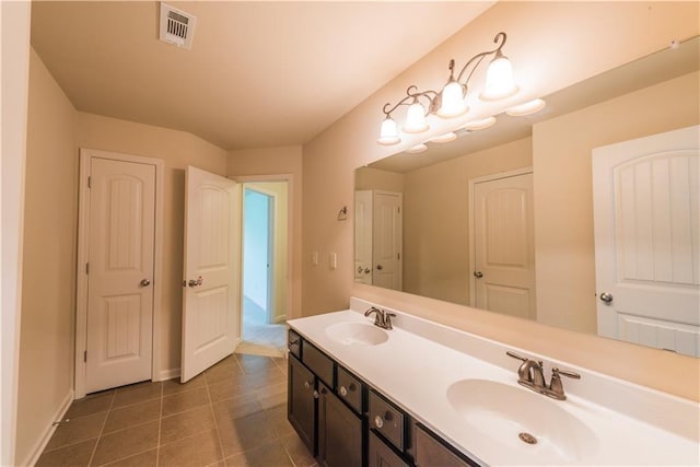 570 Eldridge Dr, Suwanee, GA 30024 - full bathroom featuring a sink, baseboards, double vanity, and visible vents