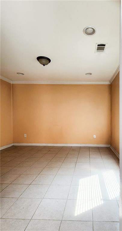 570 Eldridge Dr, Suwanee, GA 30024 - empty room featuring crown molding, light tile patterned floors, and visible vents
